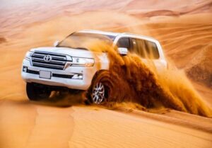Dubai: Desert Safari, Camel Ride, Quad Bike & BBQ Dinner - Camel Rides, Henna, and Traditional Photo Moments